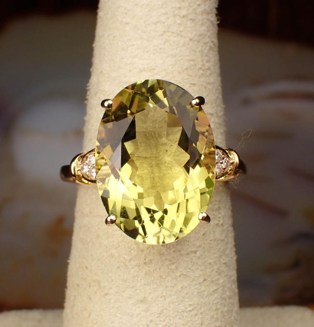 Appraisal: LEMON CITRINE DIAMOND AND FOURTEEN KARAT GOLD RING The yellow