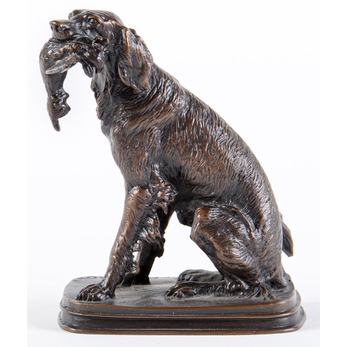 Appraisal: A bronze sculpture of a retriever and pheasant cast from