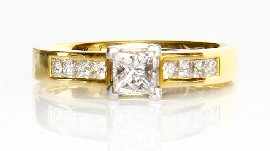 Appraisal: An ct gold princess cut diamond ring with diamond set