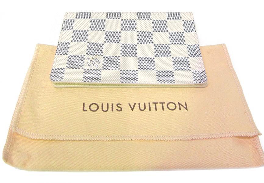 Appraisal: A LOUIS VUITTON WALLET IN AZUR DAMIER CANVAS A LOUIS