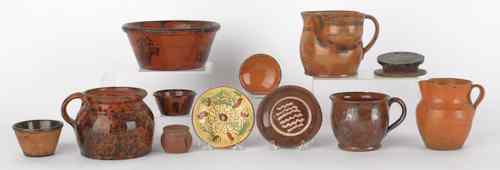 Appraisal: Collection of redware to include a shaving mug a match