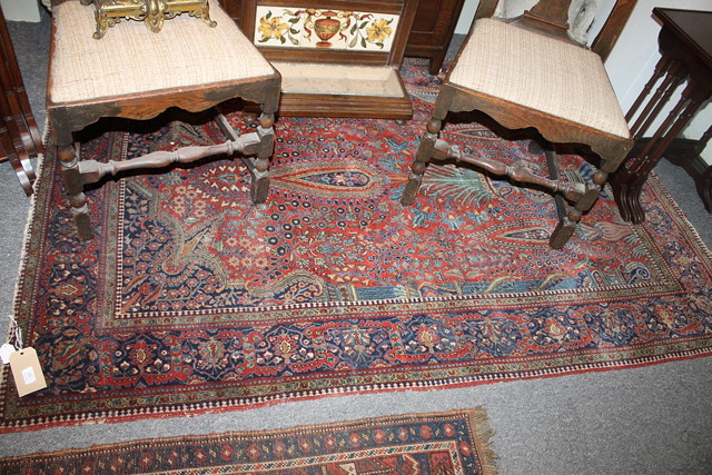 Appraisal: A KASHAN RED GROUND RUG with Tree of Life design