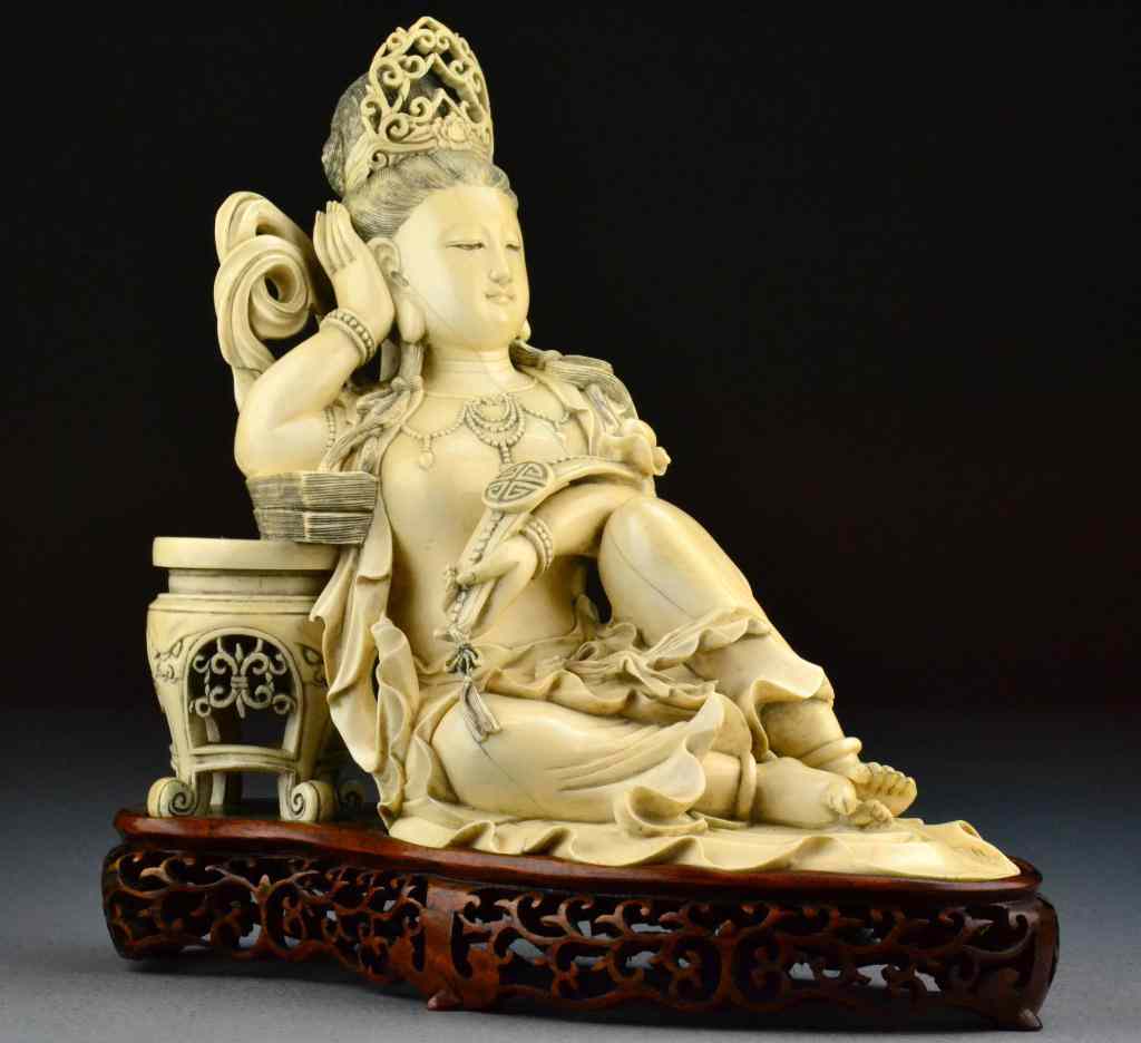 Appraisal: A Monumental Chinese Carved Ivory Guan-YinAn exquisite Chinese Republic period