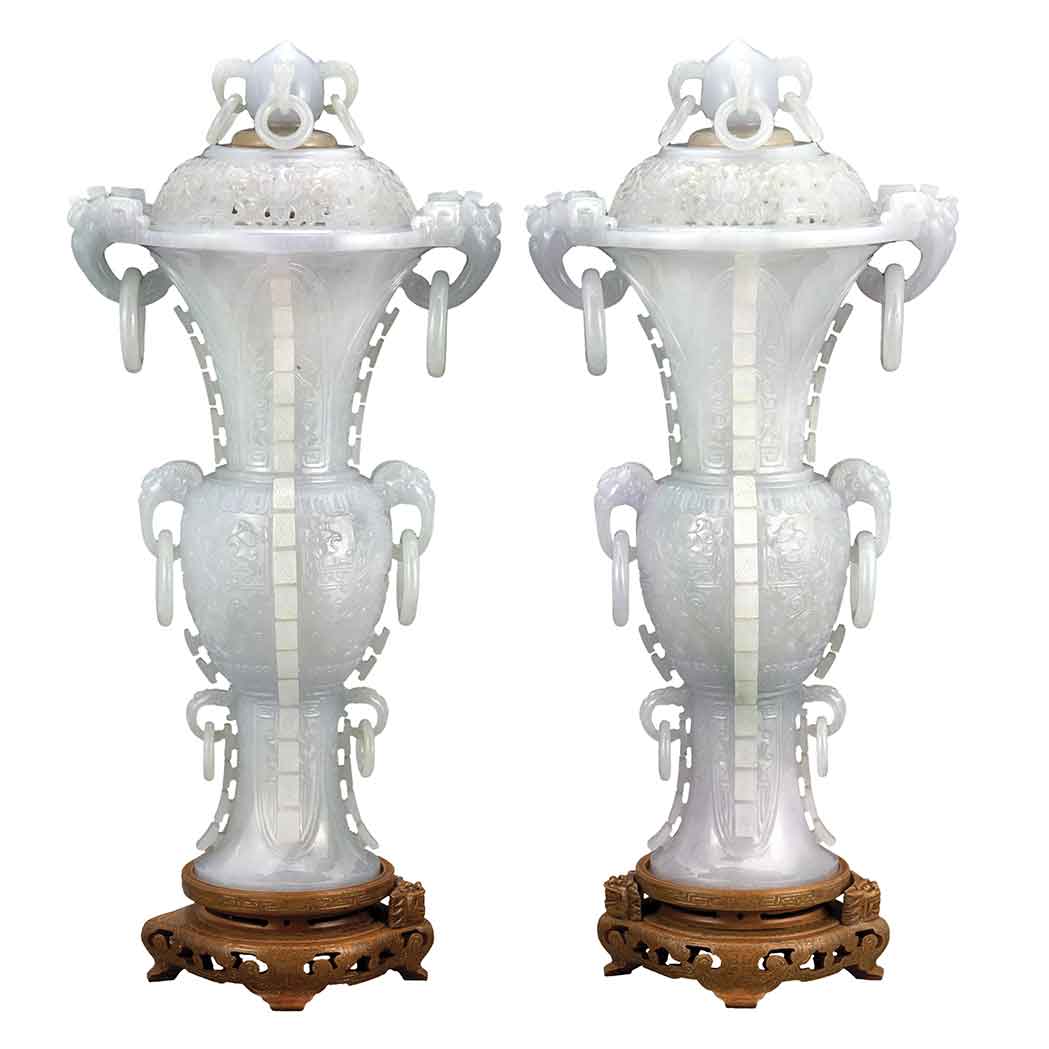 Appraisal: Pair of Chinese Jadeite Covered Vases th Century Each of