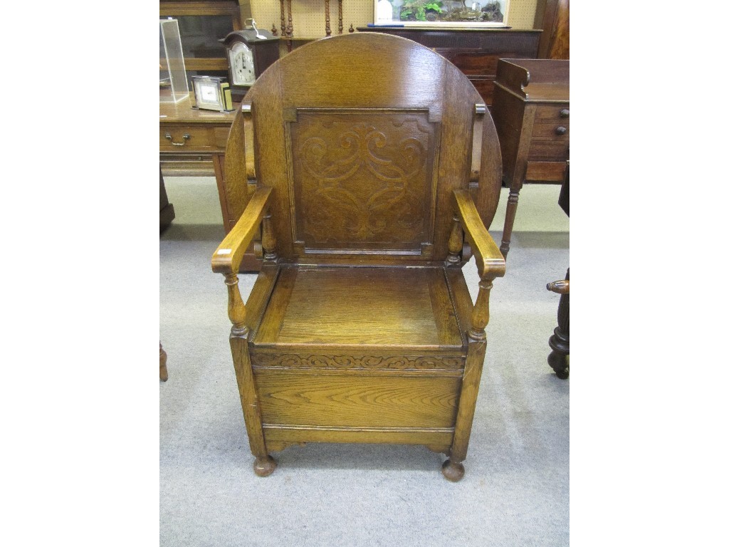 Appraisal: Oak monks style hall seat