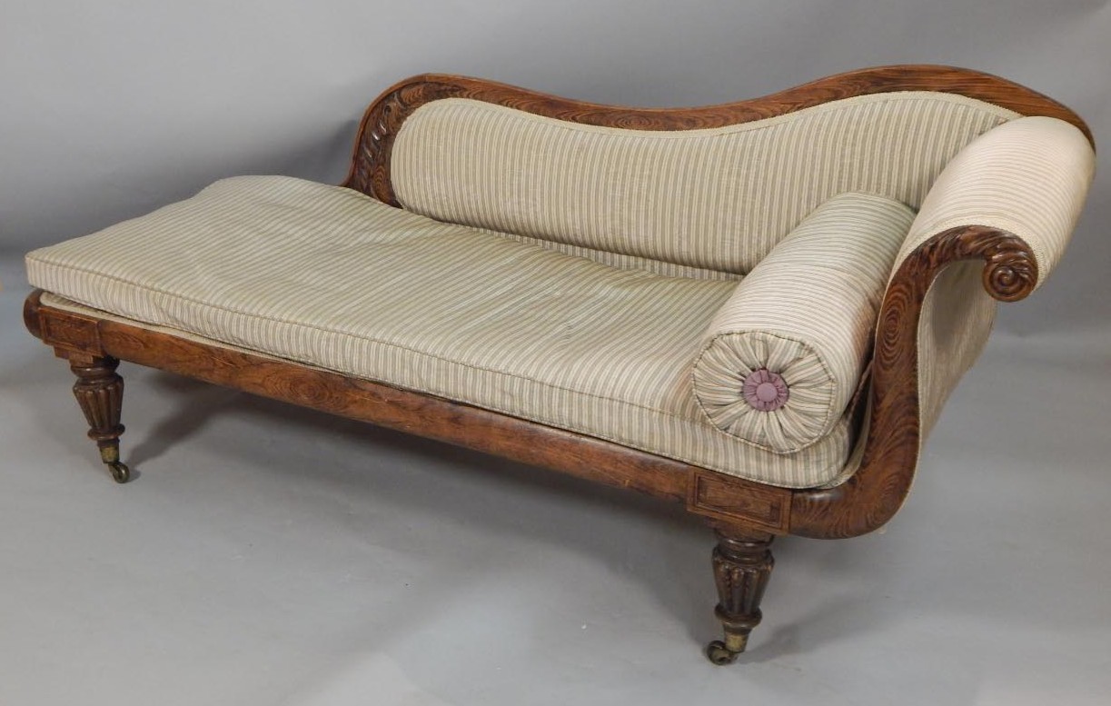 Appraisal: A William IV simulated rosewood chaise longue with a padded