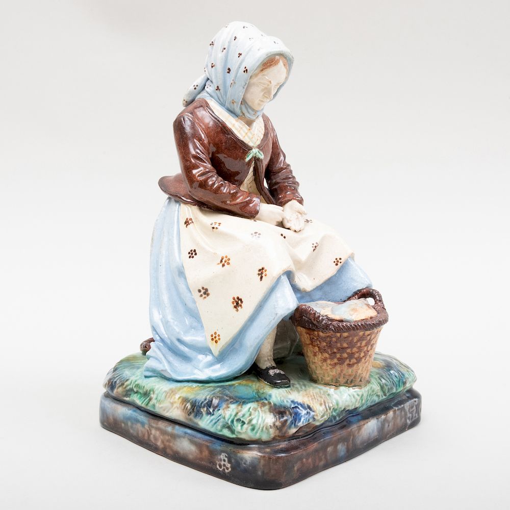 Appraisal: English Pearlware Model of a Fish Seller in high Condition