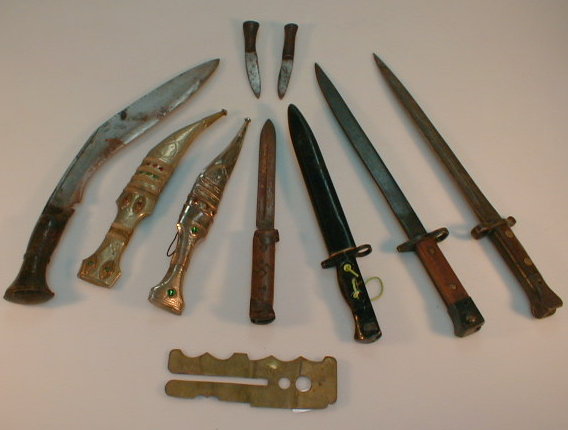 Appraisal: A small group of bayonets knives and short swords