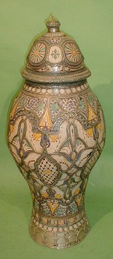 Appraisal: A maiolica baluster vase and cover with white metal applied