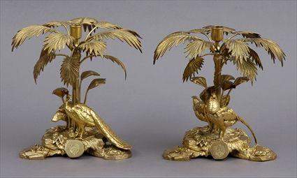 Appraisal: PAIR OF ELKINGTON CO ARMORIAL GILT-METAL CANDLESTICKS Marked Published by