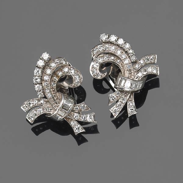 Appraisal: A pair of diamond and k white gold scroll clip-earrings