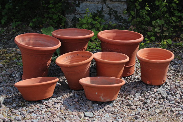 Appraisal: A WHICHFORD TERRACOTTA GARDEN PLANT POT decorated with three Tudor