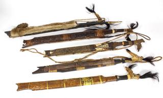 Appraisal: lot of Dayak swords with scabbards having carved horn handles