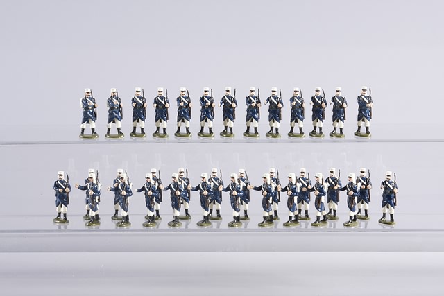 Appraisal: A similar lot of metal French Foreign Legion marching at