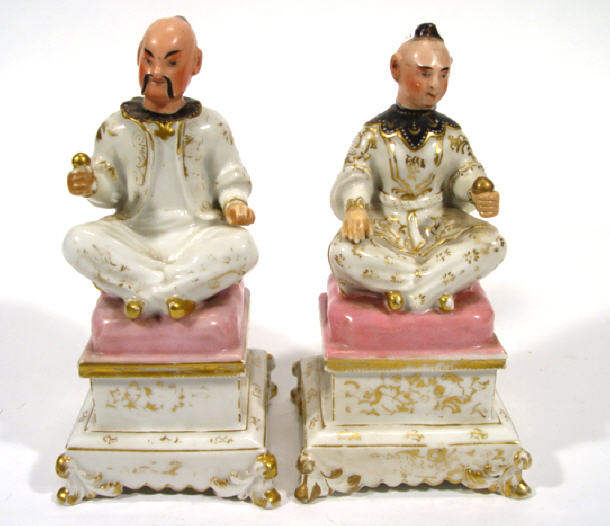 Appraisal: Two Victorian Staffordshire Turk inkwells the figures with detachable heads