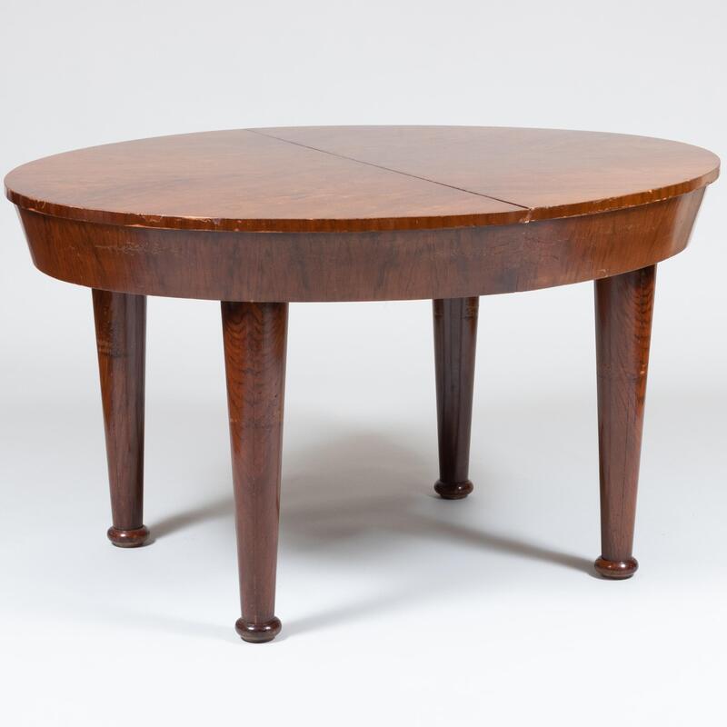 Appraisal: Late Art Deco Rosewood Oval Extending Dining Table in x