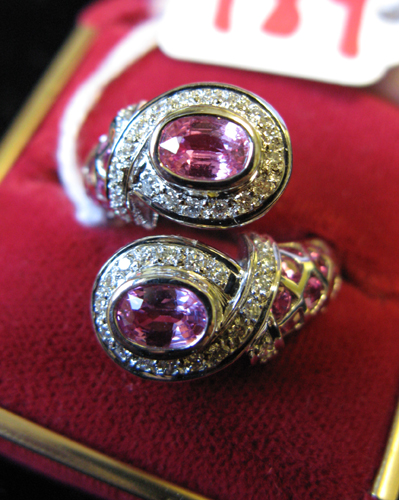 Appraisal: PINK SAPPHIRE DIAMOND AND EIGHTEEN KARAT WHITE GOLD RING The