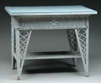 Appraisal: WHITE WICKER TWO TIER TABLE The wood top fitted with