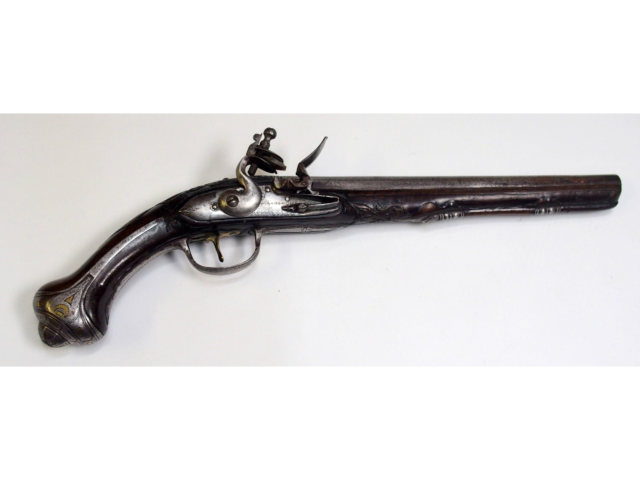 Appraisal: An Indo-Persian flintlock pistolthe steel barrel cm long with Islamic