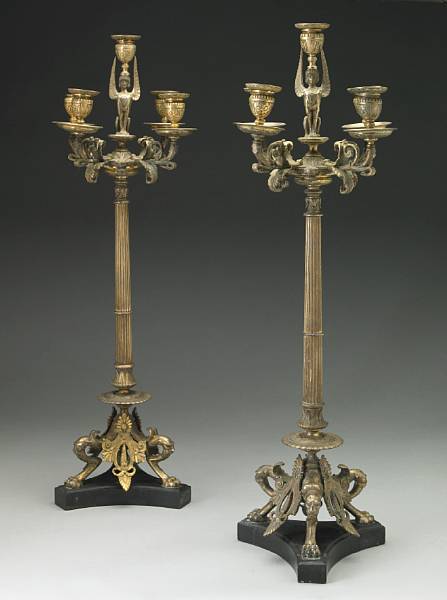 Appraisal: A pair of Charles X style silver gilt-bronze candelabra late