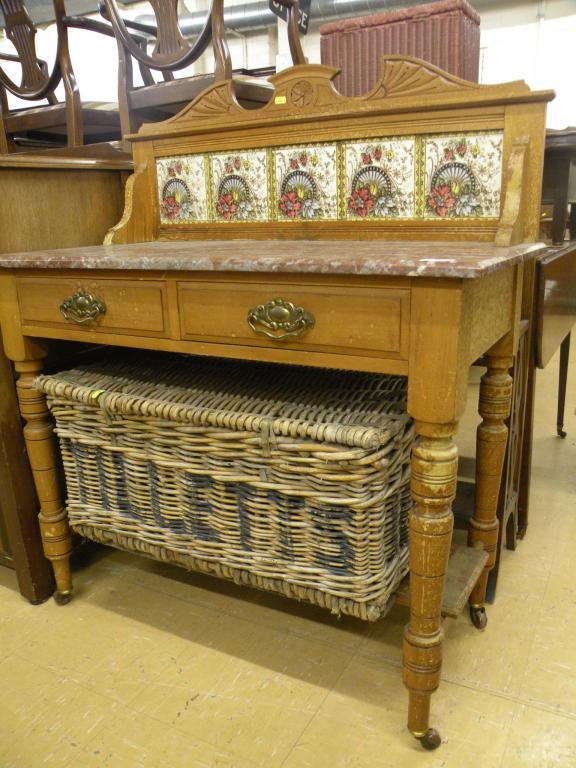 Appraisal: A Victorian and marble topped walnut washstand and a linen