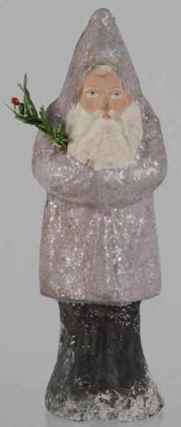 Appraisal: Pink Belsnickel Santa Candy Container Description Folded arms holding fir