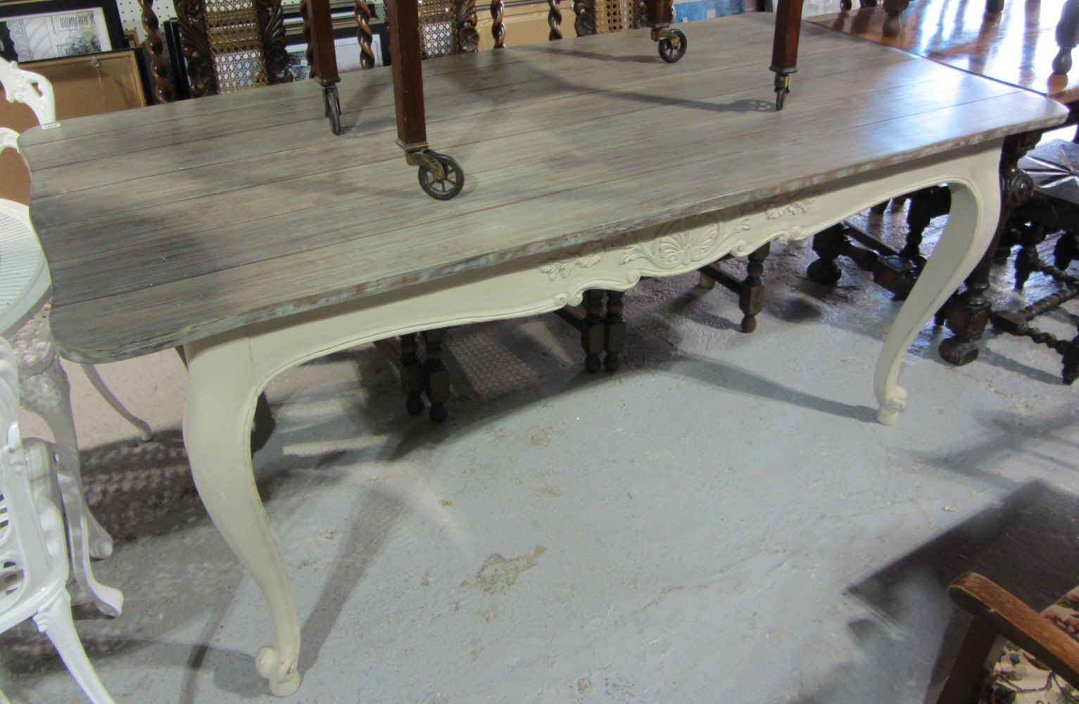 Appraisal: A th century Louis XV style dining table with grey