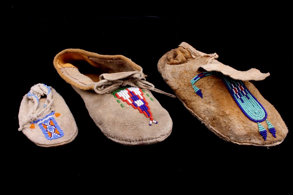 Appraisal: Northern Plains Beaded Hide Moccasins x Singles The lot features