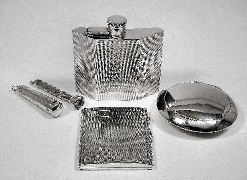 Appraisal: A George VI silver spirit flask with curved and angled