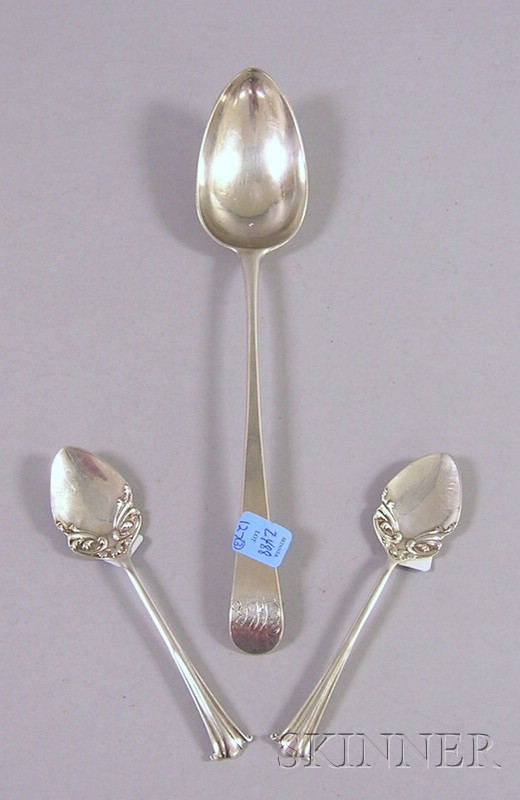 Appraisal: Three English Silver Flatware Items a silver stuffing spoon by