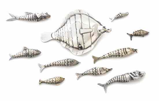 Appraisal: A Collection of Eight Silver or Silverplate Diminutive Reticulated Fish