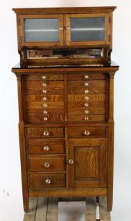 Appraisal: Antique American dental cabinet in oak with black glass top