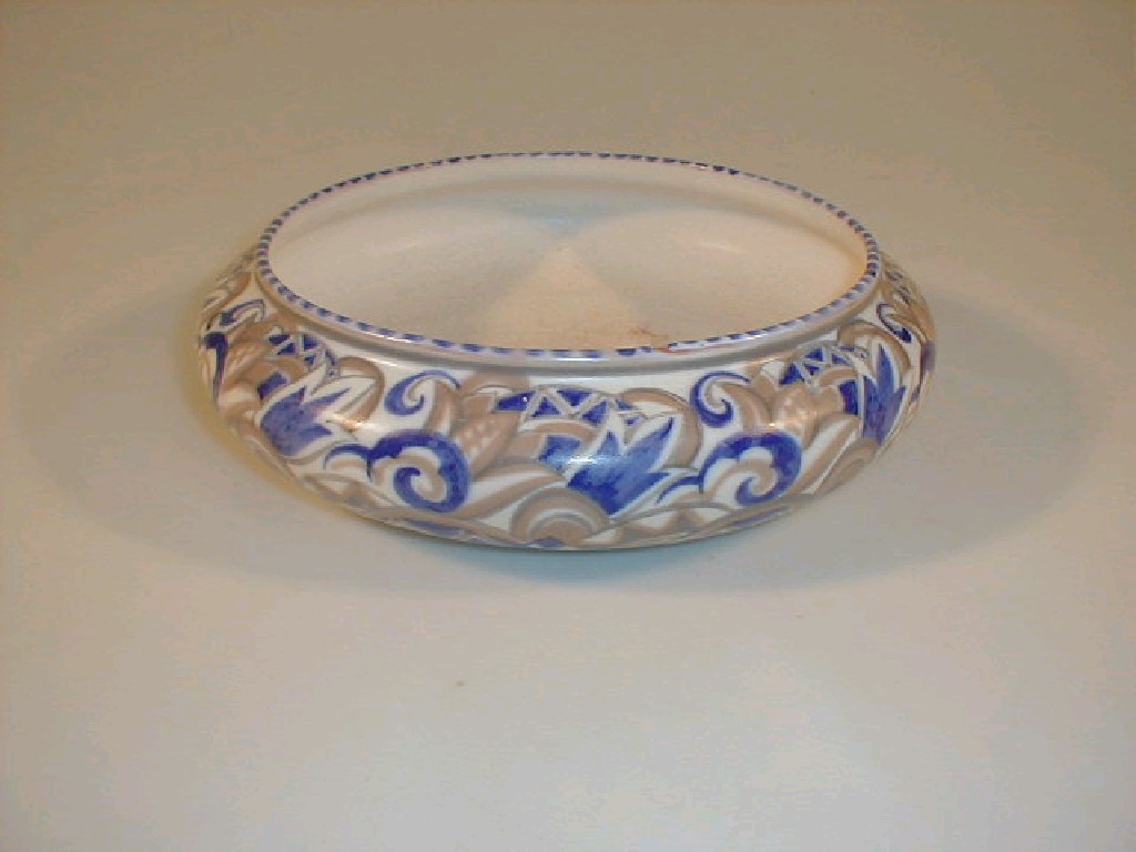 Appraisal: A Carter Stabler Adams Poole shallow circular bowl with slightly