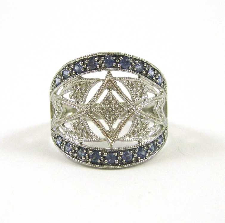 Appraisal: SAPPHIRE DIAMOND AND FOURTEEN KARAT GOLD RING The pierced white