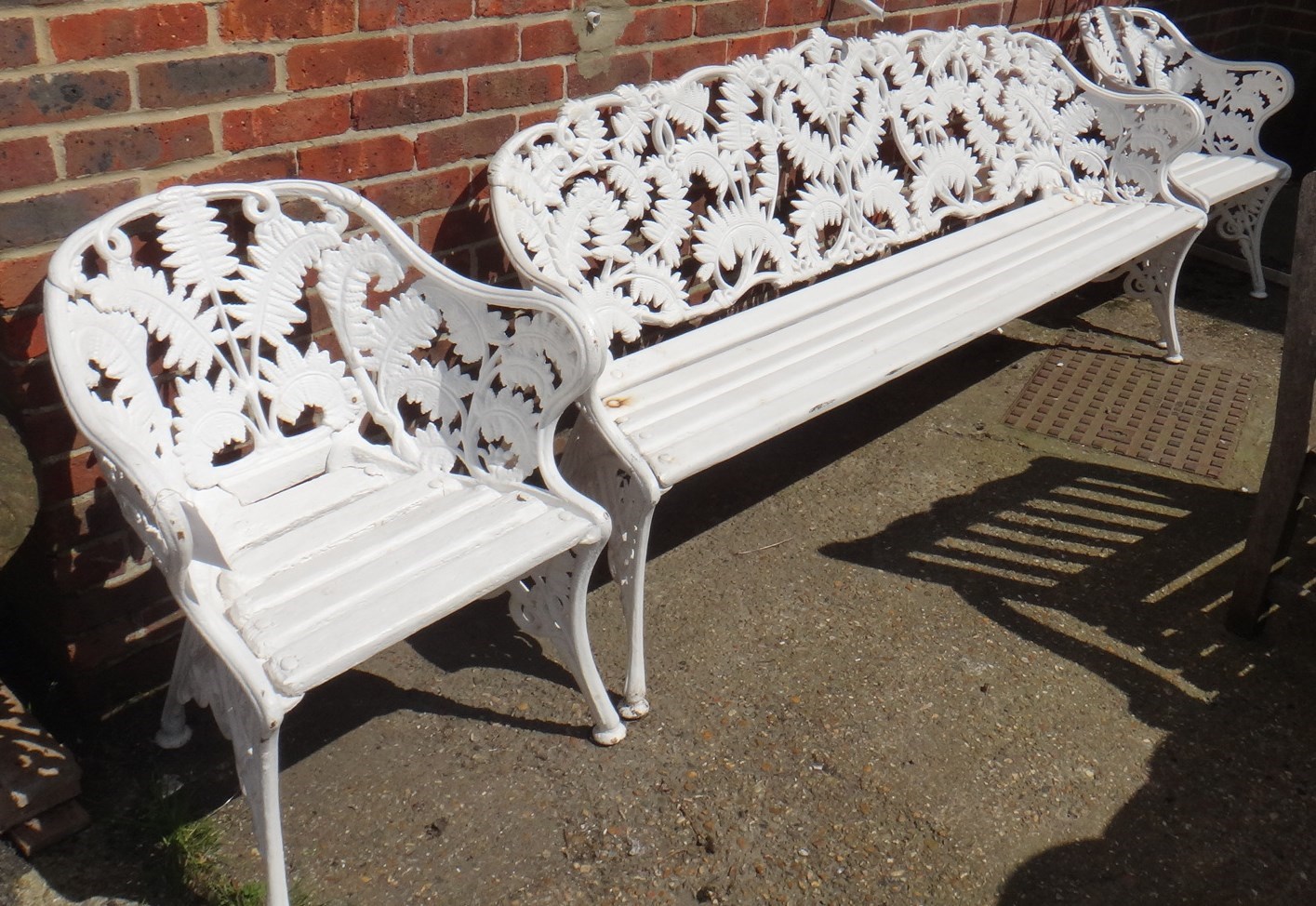 Appraisal: A Coalbrookdale style cast iron fern pattern garden bench cm