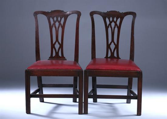 Appraisal: PAIR CHIPPENDALE MAHOGANY SIDECHAIRS th century with red leather slip-seats