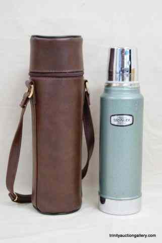 Appraisal: Stanley Thermos with Leather Holder - CarrierProduced by Aladdin dates