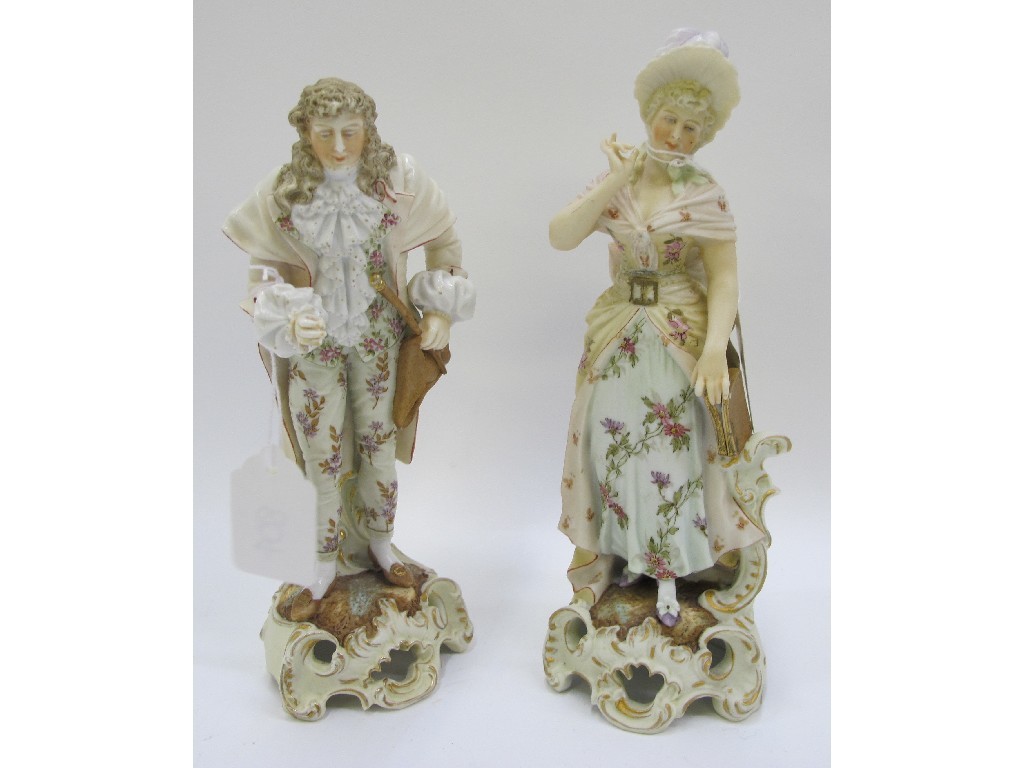 Appraisal: Pair of continental bisque figures of a man and woman