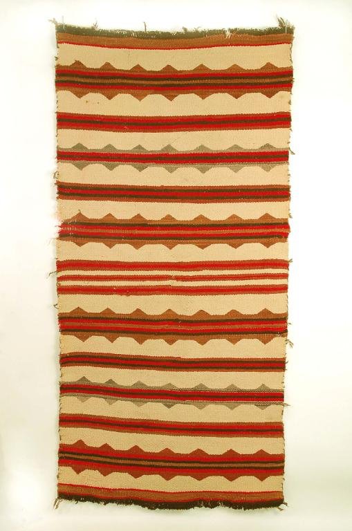 Appraisal: DESCRIPTON An early th century Navajo rug featuring alternating bands