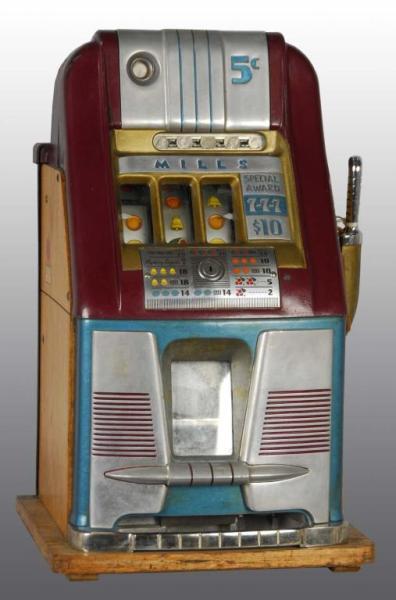 Appraisal: -Cent Mills High-Top Slot Machine Description Hand-loaded jackpot Working Serial