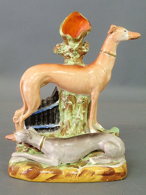 Appraisal: Rare Staffordshire figural group spill vase with one standing whippet