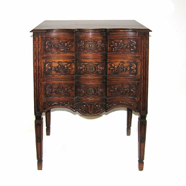 Appraisal: A Louis XVI style mixed wood three drawer chest height