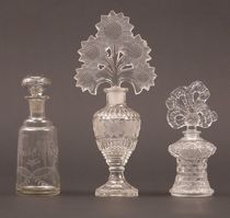 Appraisal: A Trio of Stoppered Dresser Bottles This trio of glass