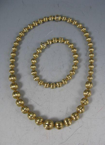 Appraisal: KT Gold Bead Bracelet and Necklace necklace with yellow gold