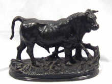 Appraisal: A cast iron model of a bull dated