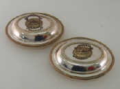 Appraisal: A pair of silver-plated oval bead-edged entr e dishes and