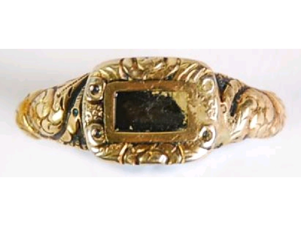 Appraisal: VICTORIAN CHASED GOLD RING with oblong glazed hair locket top