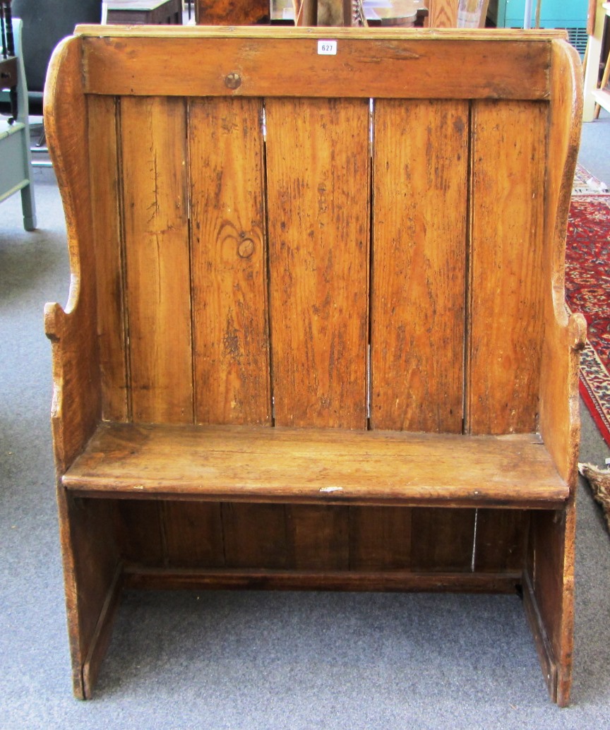 Appraisal: A th century pine small high back settle on slab