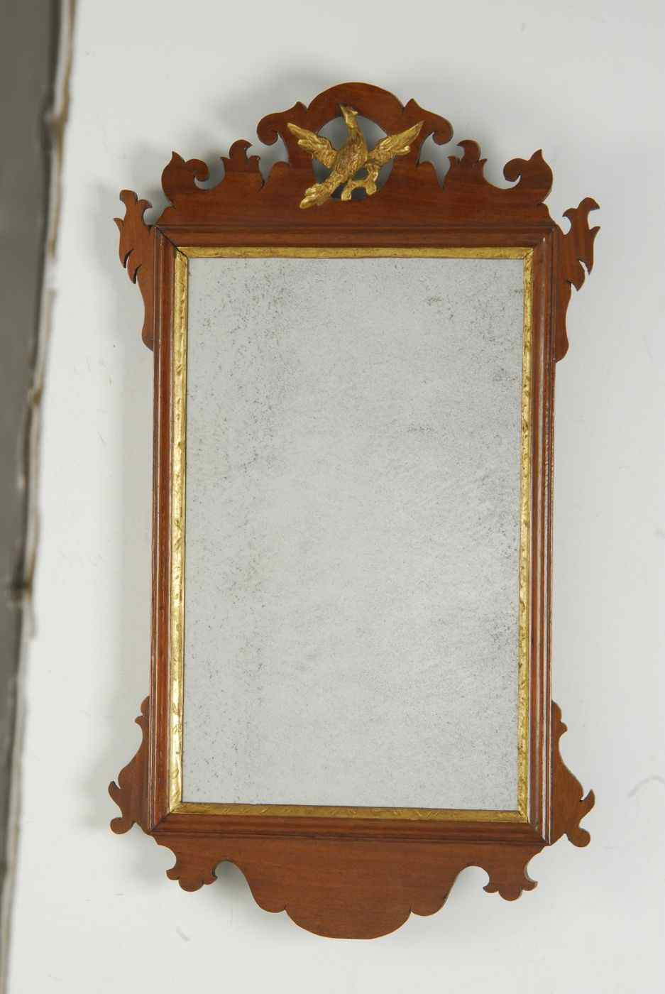 Appraisal: ANTIQUE AMERICAN CHIPPENDALE MIRRORCirca With gilt phoenix crest and liner