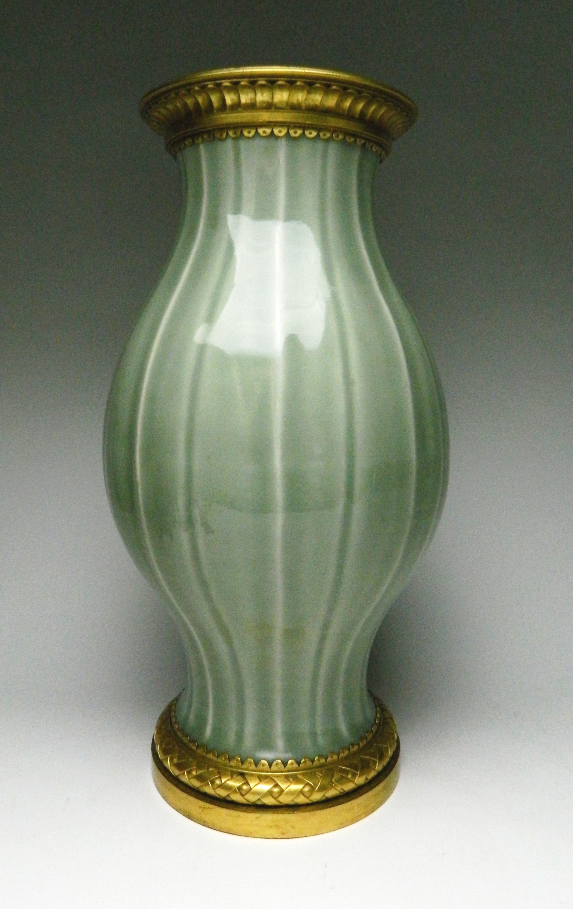 Appraisal: A fine Chinese celadon-glazed vase Qing Dynasty Qianlong mark and